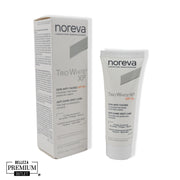 Noreva Trio White XP SPF 50+ – Protección solar avanzada y cuidado antimanchas en un solo paso.